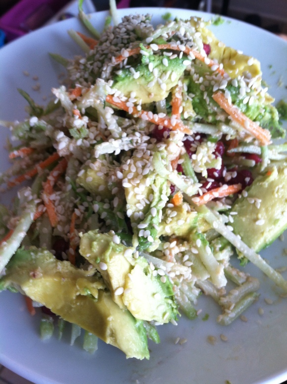 Gluten free, Vegan Tahini coleslaw with dried cranberries and avocado, topped with white sesame seeds--YUM!